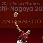 Alwi Farhan melakukan pukulan smash pada laga tunggal putra Asian Games 2026 Aichi-Nagoya