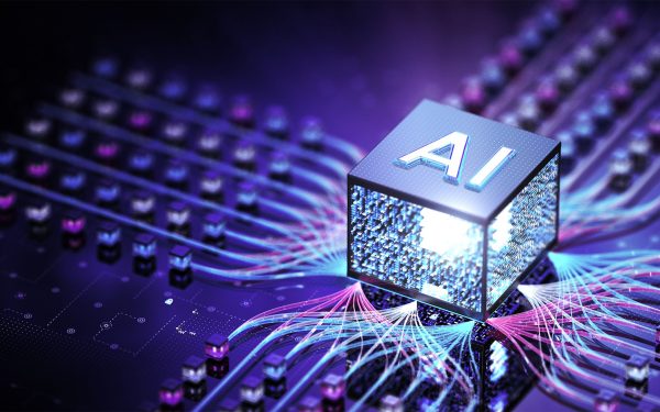 Kubus bertuliskan AI menyala di atas papan sirkuit futuristik dengan aliran data biru dan merah muda